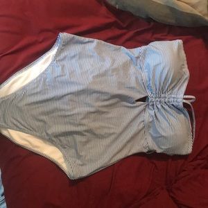 One piece “cheeky” bathing suit.